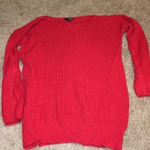 red pull over sweater